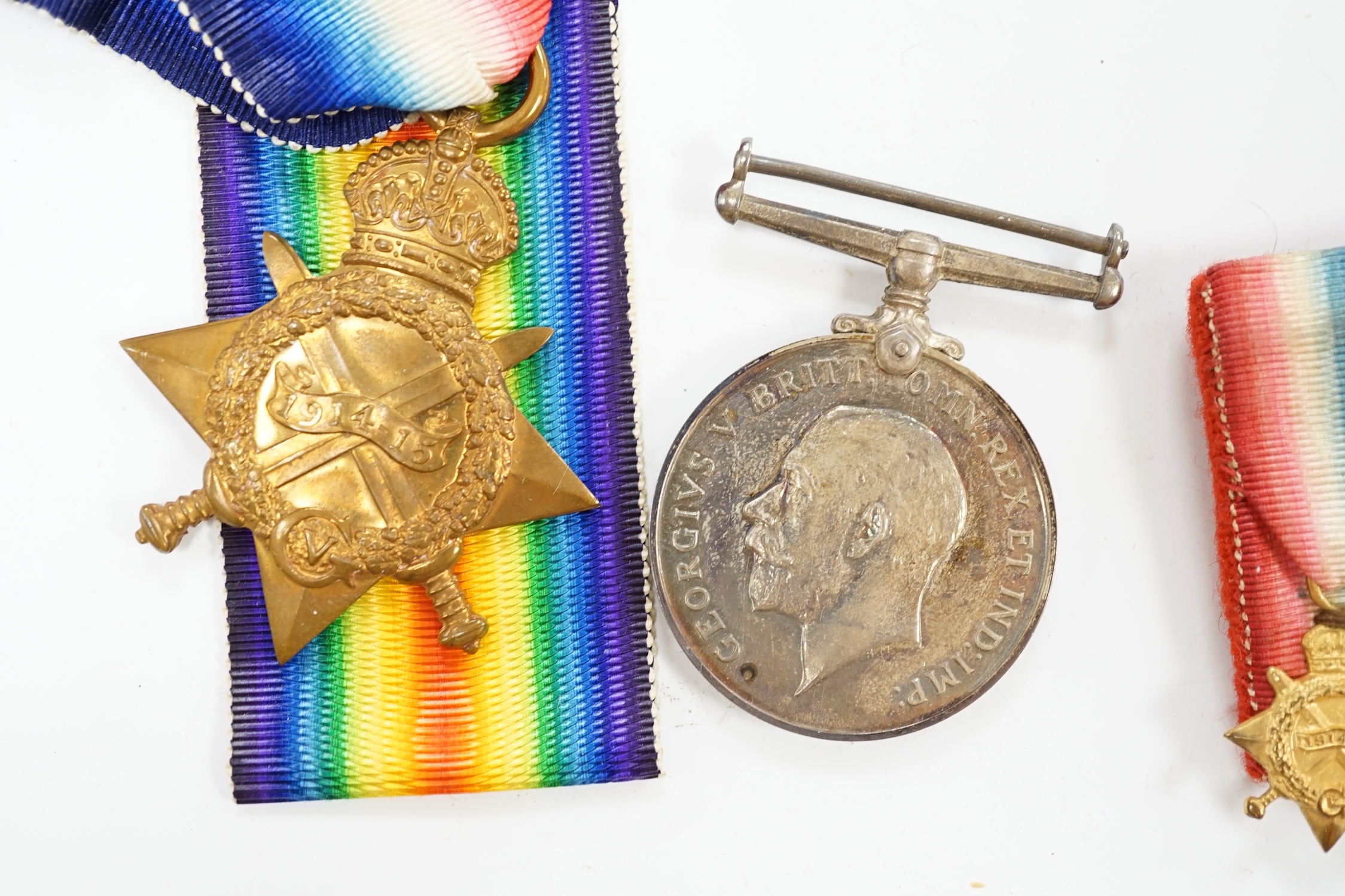 A First World War medal trio awarded to Pte. R.N. Randell, Canadian Forces, together with the miniature set, original card box of issue, the original envelope, paperwork and War Office issued folder. Condition - fair to